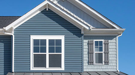 Vinyl Siding with Ontario Siding and Gutter: Transforming Homes with Durability and Style